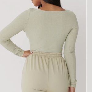 Brand new Meshki bodysuit